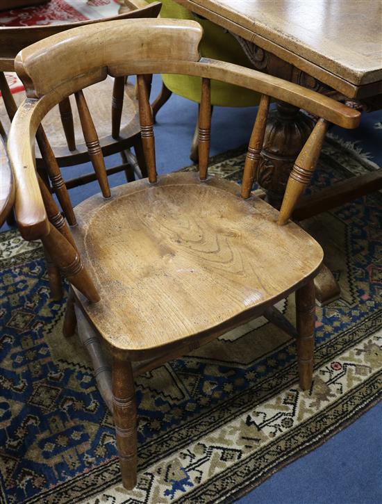 A pair of tub chairs